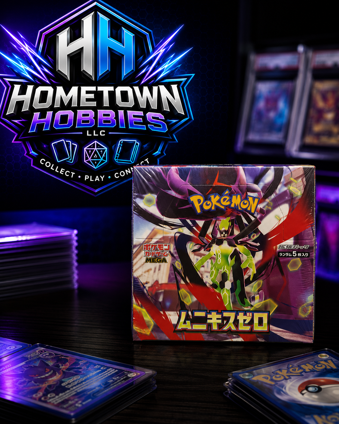 A boxed Pokémon MEGA Mini-Card Set box is displayed on a dark table with stacks of trading cards around it and a large Hometown Hobbies LLC logo in the background.
