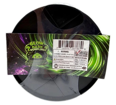 A roll of glow-in-the-dark plastic bagging tape from Noobiyu, featuring a black circular roll with a colorful green and purple cosmic-themed paper band label.