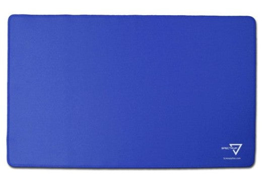A blue rectangular desk mat with rounded corners and a small white logo in the bottom right corner, shown on a plain white background.