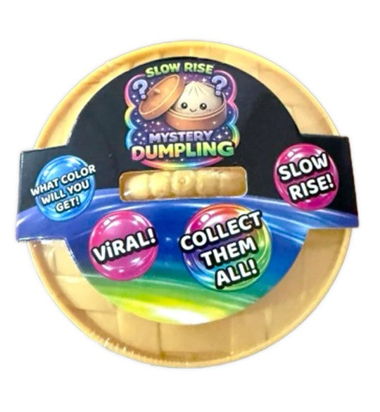 A packaged toy product labeled 'Mystery Dumpling' with a gold circular base, colorful printed graphics, and a small clear window showing a beige dumpling-like toy inside. The packaging includes text such as 'Slow Rise,' 'Viral!,' and 'Collect Them All!'.