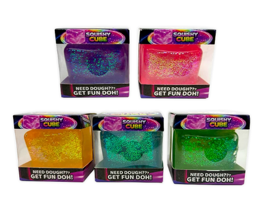 Five packaged 'Squishy Cube' mystery squeeze toys in different neon glitter colors (purple, pink, orange, teal, and green) arranged on a white background.